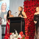 Winner of 2024 Magnify Her Business Woman of the Year Awards - Grace Kelly giving a speech.